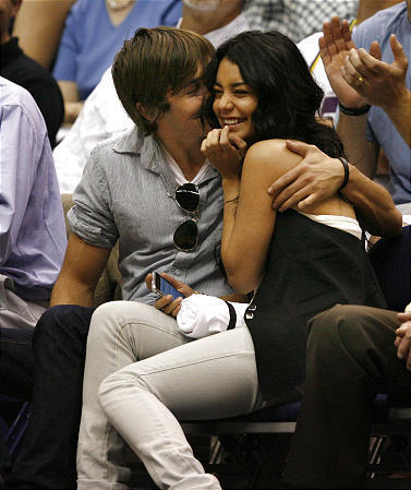 Zac Efron and Vanessa Hudgens were'constantly touching and kissing' on 
