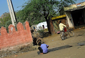 boy working on road