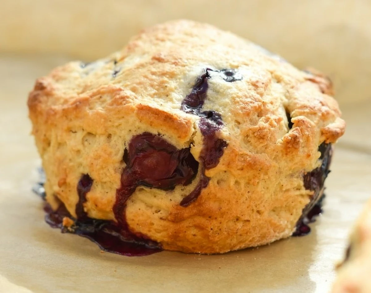 freshly baked vegan scone on parchment paper.