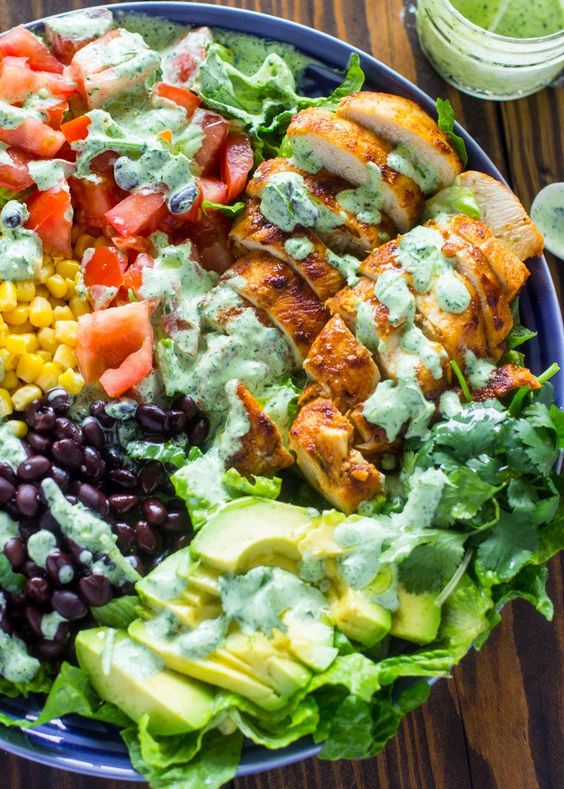 Southwestern chicken salad with creamy cilantro dressing is 1000x more delicious, fresher, and healthier than any restaurant salad at a fraction of the price. Spring is just a few weeks away and I couldn't be