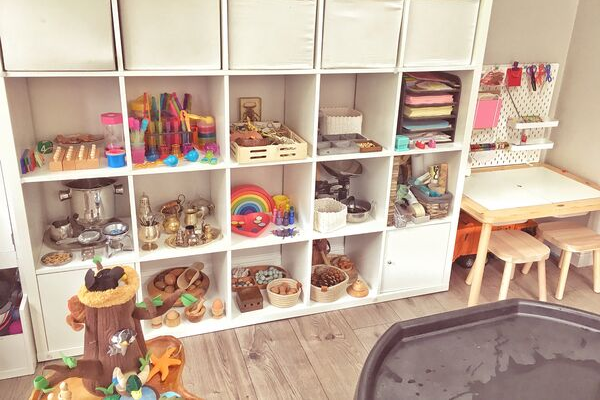 Ikea flisat table skadis pegboard desk with kallax playshelves in playroom