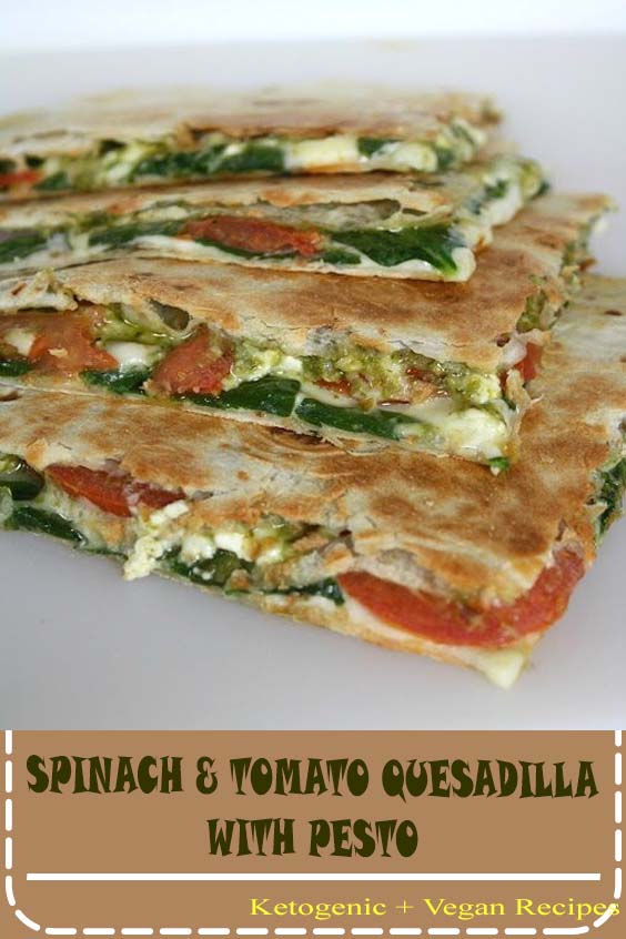 Quick and simple vegan quesadillas with spinach, tomato, and pesto! An easy, flavor-packed meal!