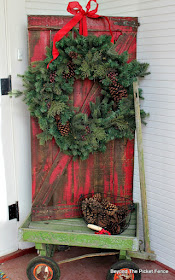 make a barn door from pallet wood to hold a wreath or other decor