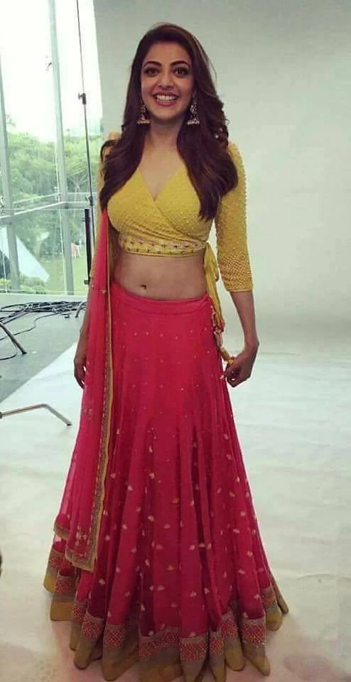 Kajal in yellow red choli