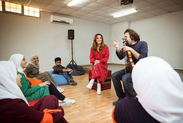 Queen Rania of Jordan visited Masahati Carnival organized by Madrasati initiative at Millennium Park in Amman. Queen wore red vintage shirt dress