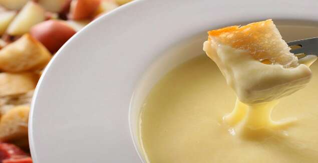 CHEESE FONDUE is primarily from ------