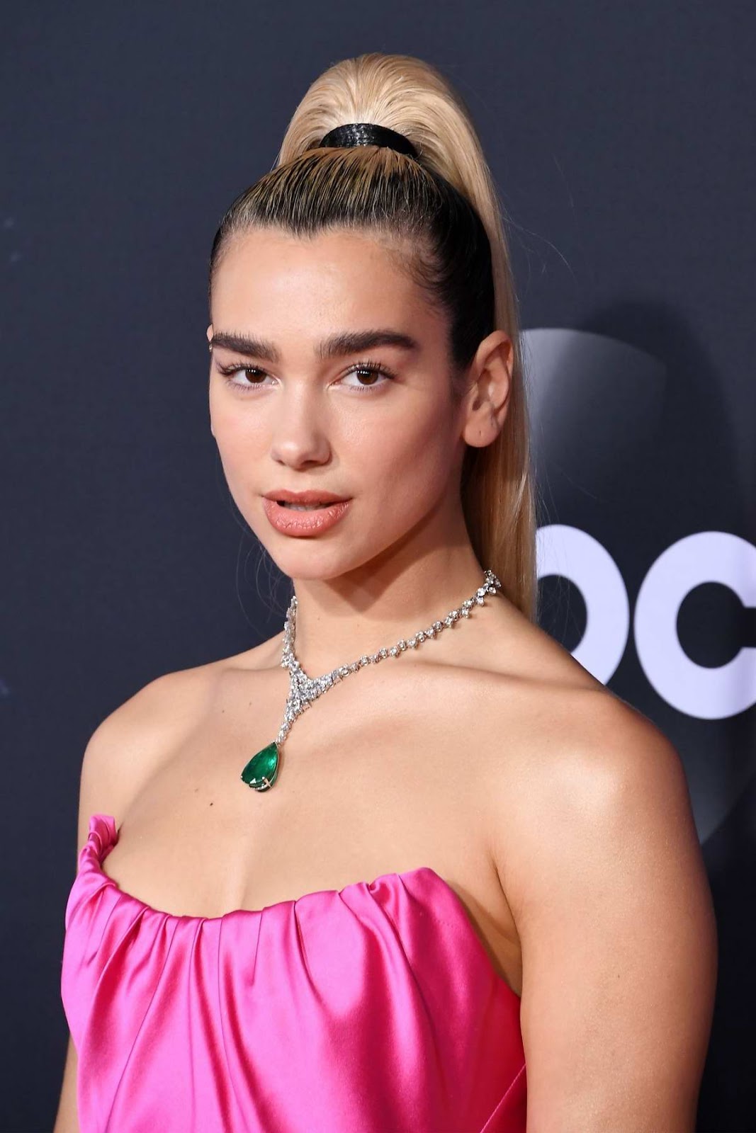 Dua Lipa best red carpet fashion dresses photo