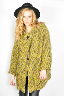 Vintage 1980's yellow chevron wool coat with black buttons.