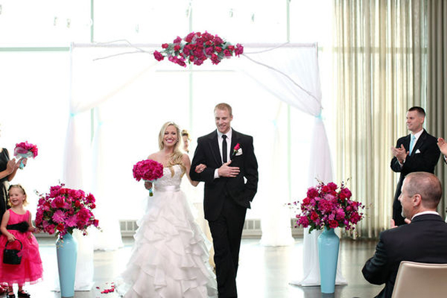 The Ceremony Decor I love the contrast between the vibrant pinks and aquas