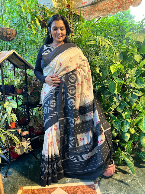 White, black and red Pochampaly ikat cotton saree.