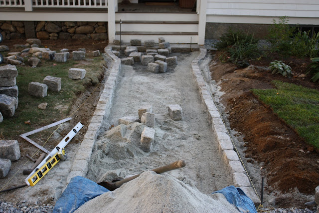 While going through some photos from last year at this time I realized that I showed you  Info FOr You renovation photo-story:  the front landscaping and cobblestone walk