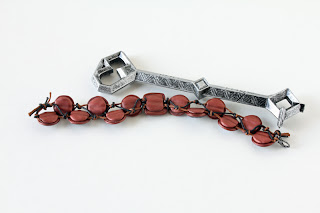 Hobbit-inspired bracelet knotting.
