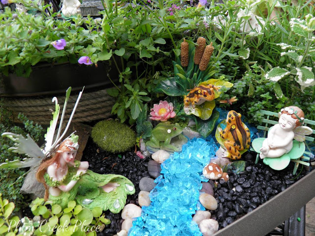 Fairy Garden 2015 made from thrift store finds.