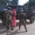 NEWS FLASH: Nigerian Troops hold suspected Kaduna bomber disguised as a woman (PHOTOS)