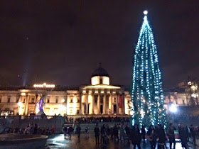Pic of Christmas tree lit up at night in Trafalgar Square, London