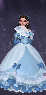 Jo in a grand blue theatrical gown with big bows and a lace fan