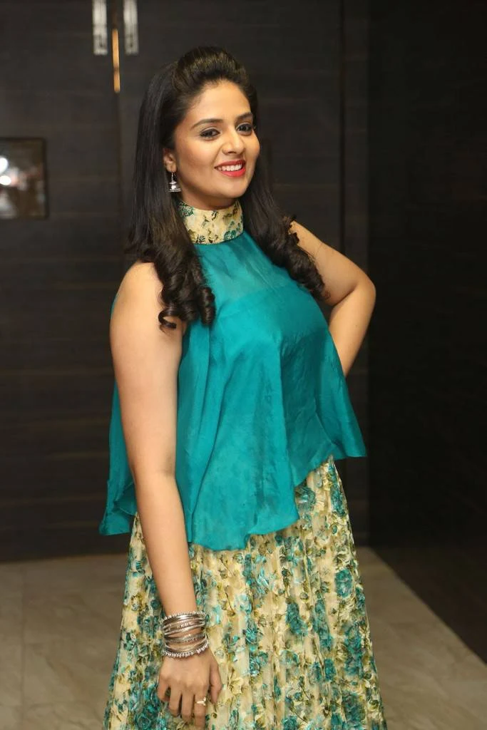 Anchor Srimukhi Stills In Green Dress At Audio Launch