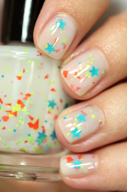 white jelly nail polish with star glitters