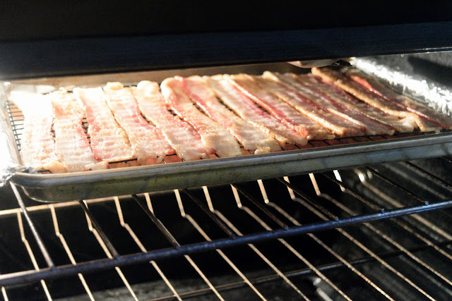 Bacon cooking in the oven.