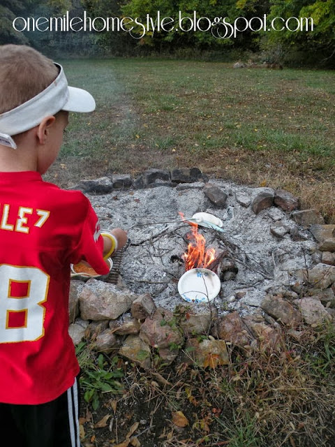 Big Brother Toasting His Marshmallows