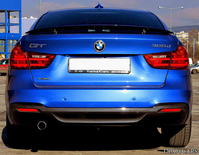 The BMW 3 Series GT rearview and the active spoiler.