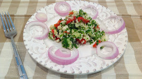 Tabbouleh Salad on Plate with red onions
