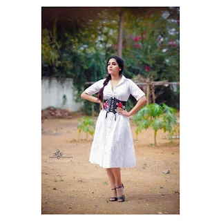 Anchor Rashmi Gautam Latest White Dress Photoshoot