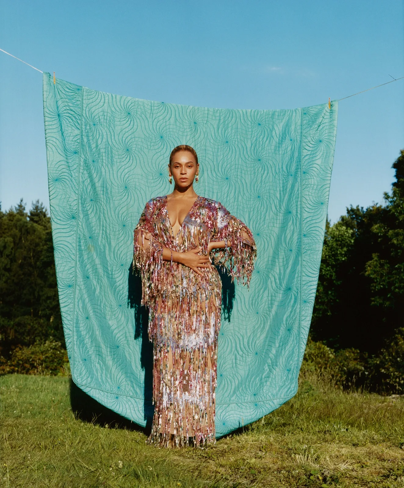 Gucci dress. Bulgari earrings. Photographed by Tyler Mitchell, Vogue, September 2018