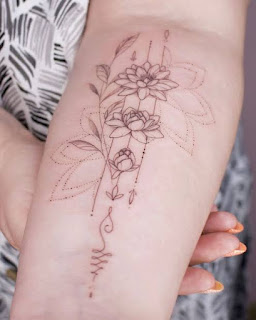 17 Beautiful Simple Line Art Floral Tattoo Designs On Wrist