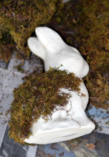 putting moss on a plain bunny figurine
