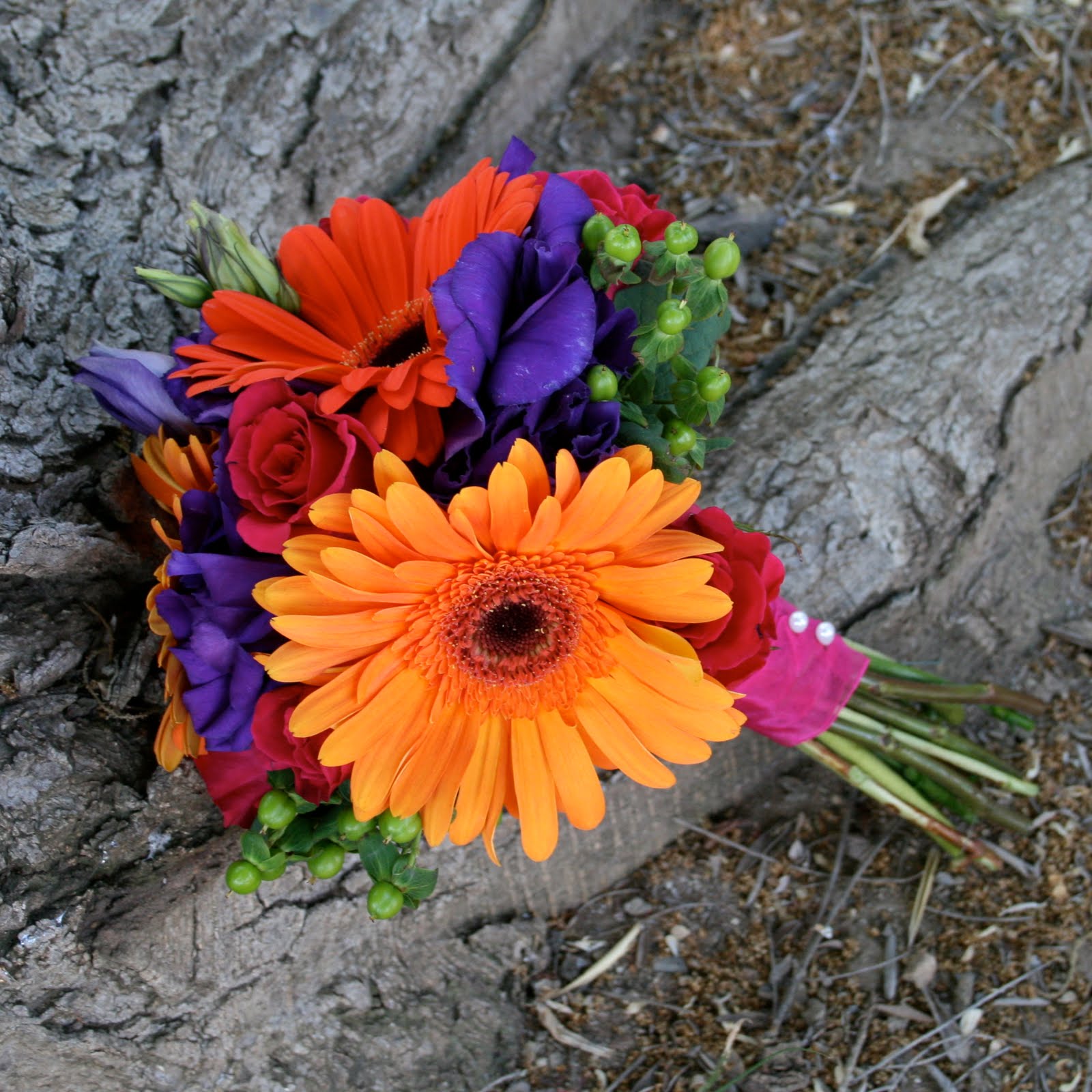 The vase and flowers sat on