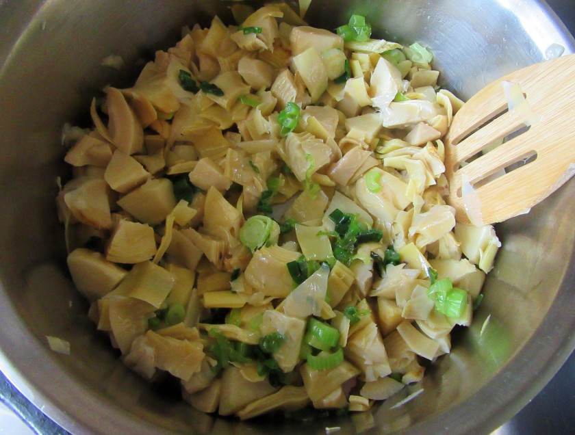 Stir in the artichoke hearts