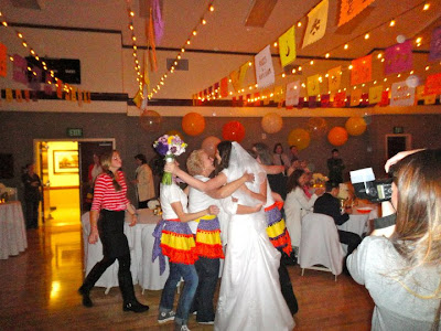  purple orange and yellow It was fun seeing them at the reception