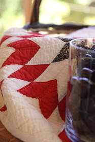 Antique doll quilt with cherries