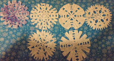 coffee filter snowflakes, Christmas craft, paper snowflakes, craft, snowflake decorations, Christmas decorations