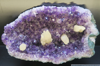 Amethyst geode with inclusions. Mineral Dept. Museum of Natural History