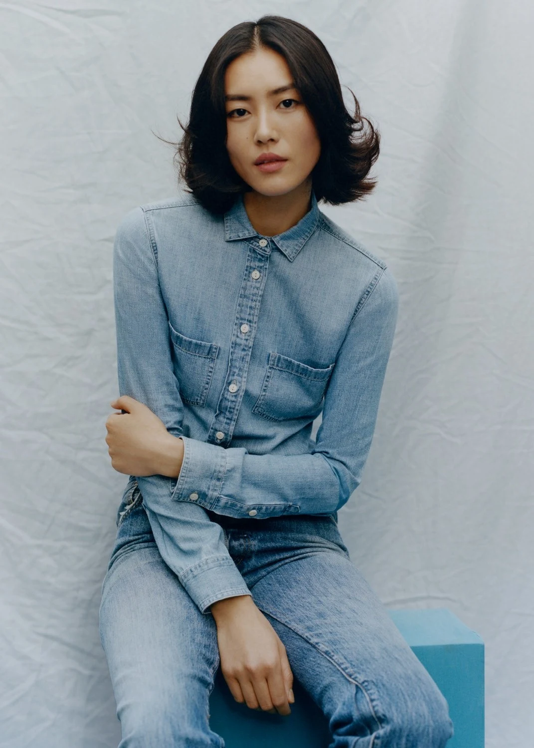 Liu Wen - J. Crew shirt. AG jeans. Photographed by Tyler Mitchell, Vogue, April 2020