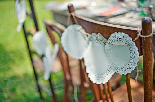 http://thelairweddings.wordpress.com/2012/02/23/chronicle-010-planning-for-wedding-chair-decor/