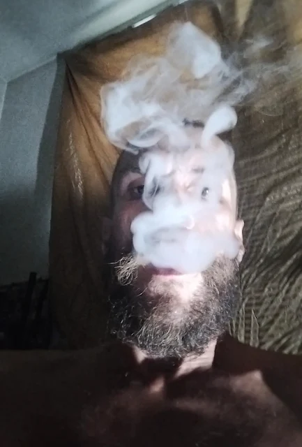 5/5 clouds of smoking enveloping from a bearded olb mouth