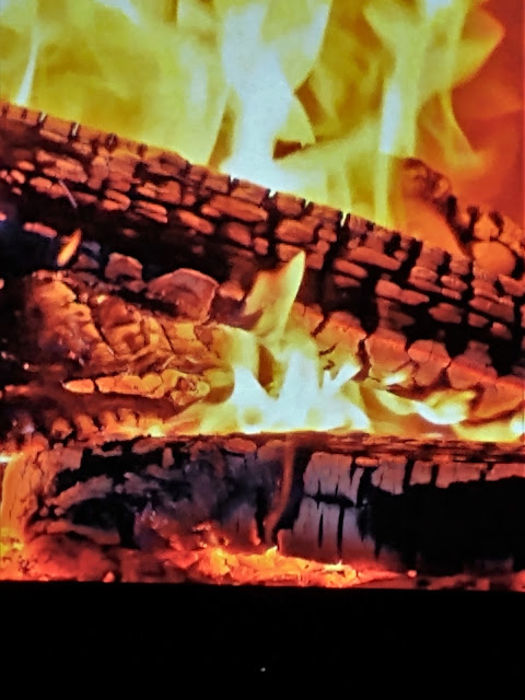 A Christmas Day fire in the fireplace via youtube. December 2022.