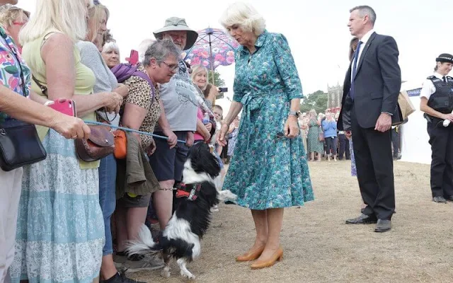 Camilla, Duchess of Cornwall wore a tropical print dress during the visit Queen Elizabeth's Sandringham estate in Norfolk