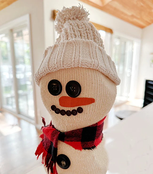snowman head with hat and scarf