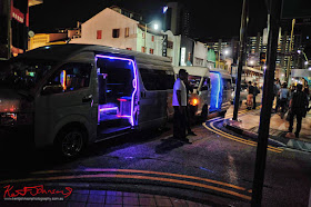 Neon lit limo-taxis on South Bridge Road Singapore -  Photo by Kent Johnson for Street Fashion Sydney.