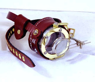 Steampunk moocle made of brass metal and leather with 2 magnifying loupe lenses (jeweler lenses) for costumes and cosplay