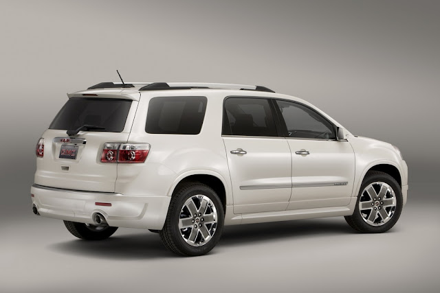 Rear 3/4 view of 2011 GMC Acadia Denali