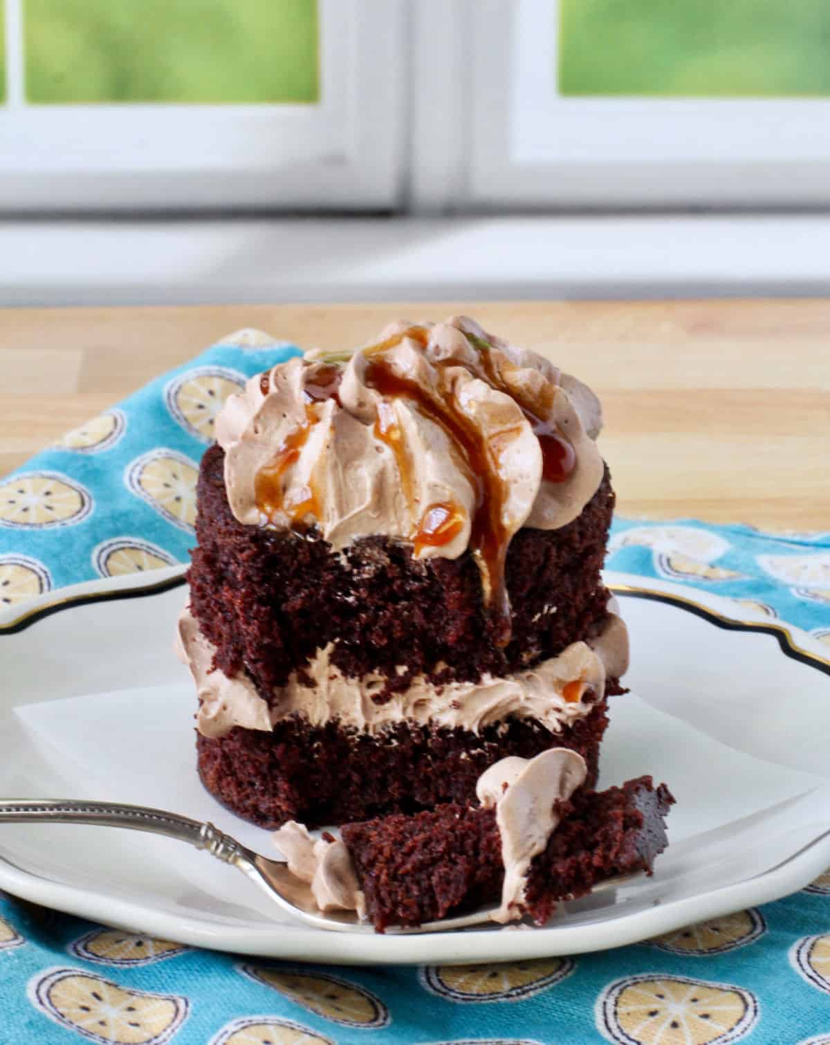 Chocolate-Espresso Cake with a fork and one bite removed.