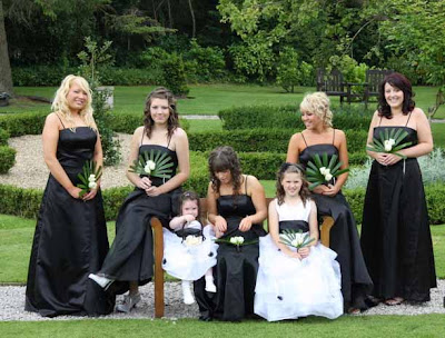 simple black and white wedding. very simple fans of white