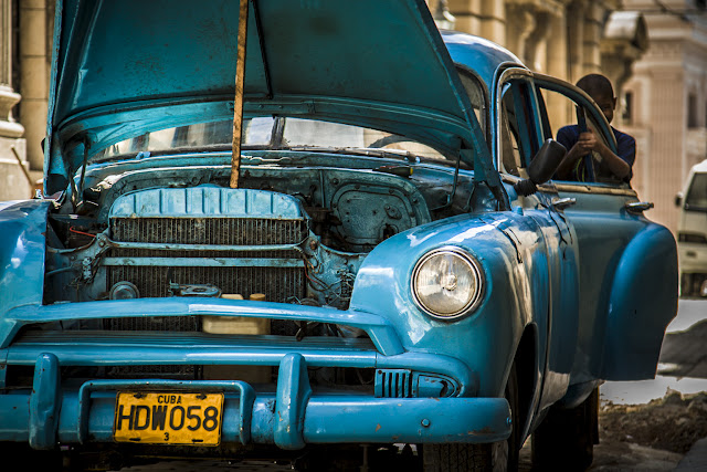 Blue classic american car in a street of Havana