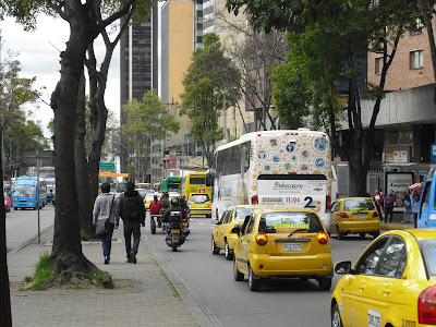 The soon to be illegal ass-and-cart struggles for position on a Bogotá street