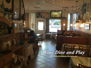 The dining room at the Nomiki's Plakka restaurant in Fort Myers, Florida